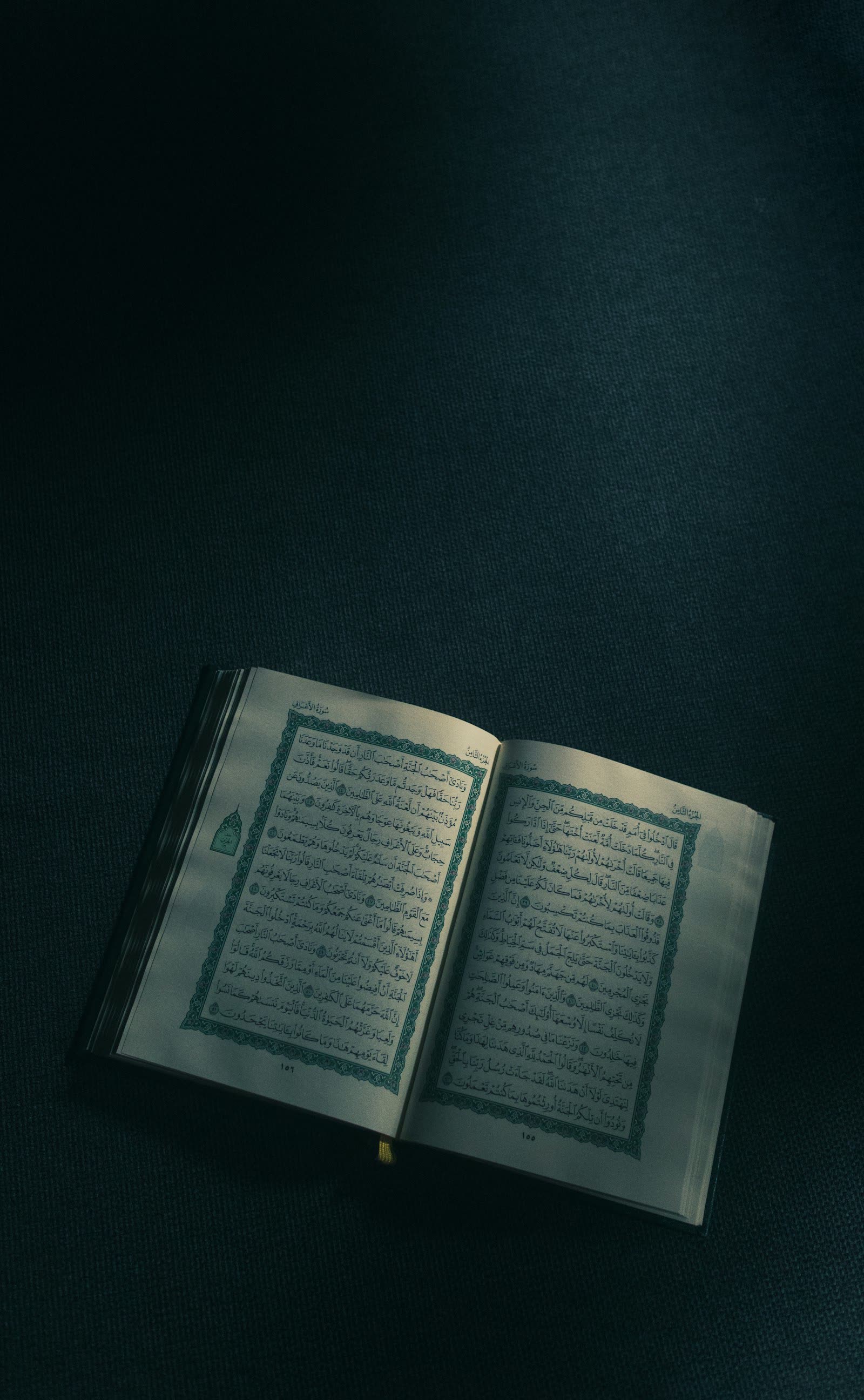 An open mushaf in soft light